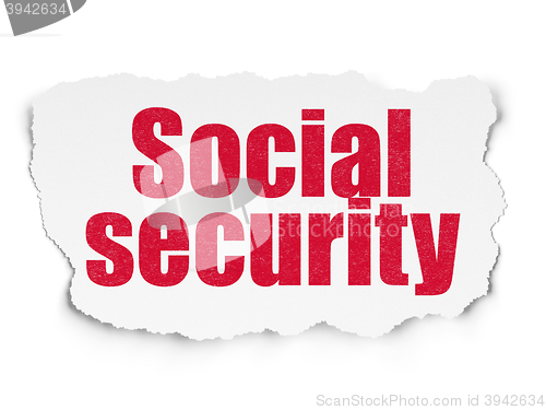 Image of Security concept: Social Security on Torn Paper background
