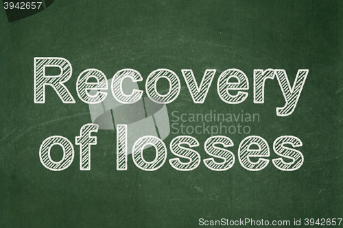 Image of Currency concept: Recovery Of losses on chalkboard background