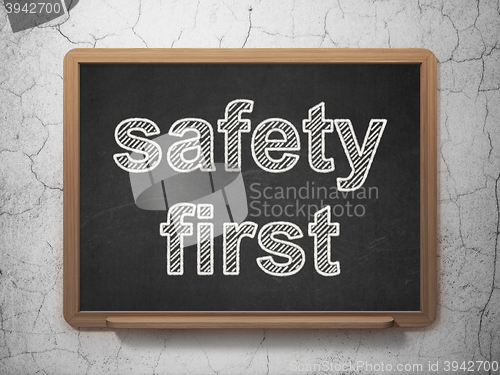 Image of Privacy concept: Safety First on chalkboard background