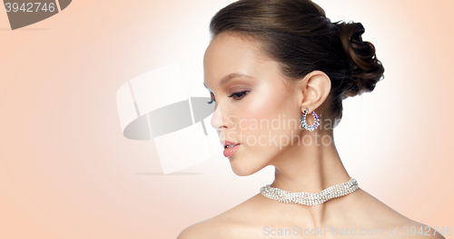 Image of close up of beautiful woman face with earring