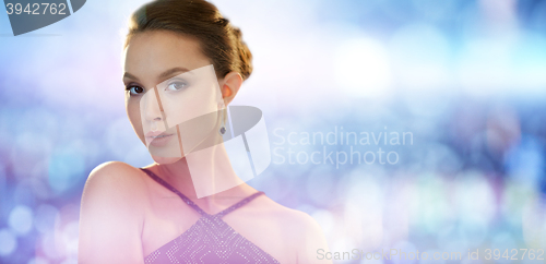 Image of beautiful young asian woman with earring