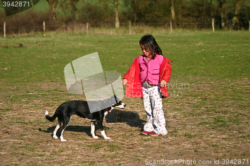 Image of Child and dog
