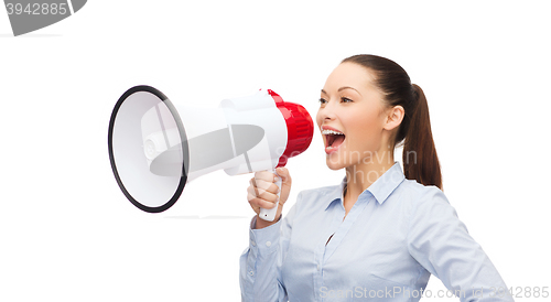 Image of screaming businesswoman with megaphone