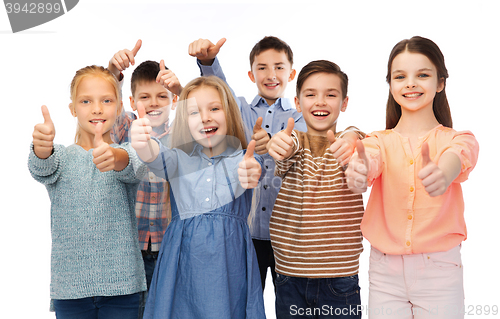 Image of happy children showing thumbs up