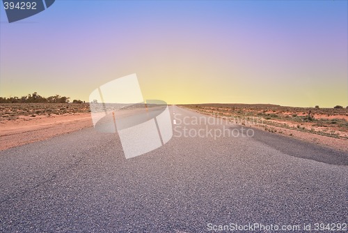 Image of driving into the sunset