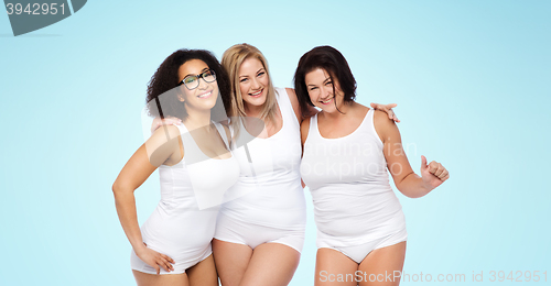Image of group of happy plus size women in white underwear