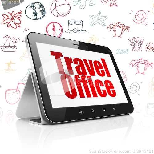 Image of Vacation concept: Tablet Computer with Travel Office on display