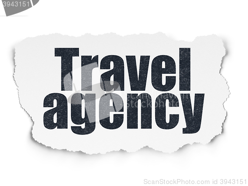 Image of Vacation concept: Travel Agency on Torn Paper background
