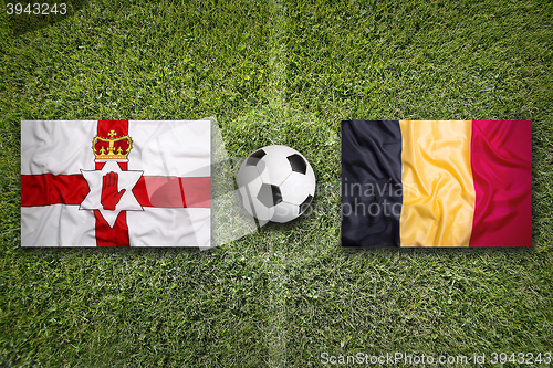 Image of Northern Ireland vs. Belgium flags on soccer field