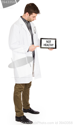 Image of Doctor holding tablet - Not healthy