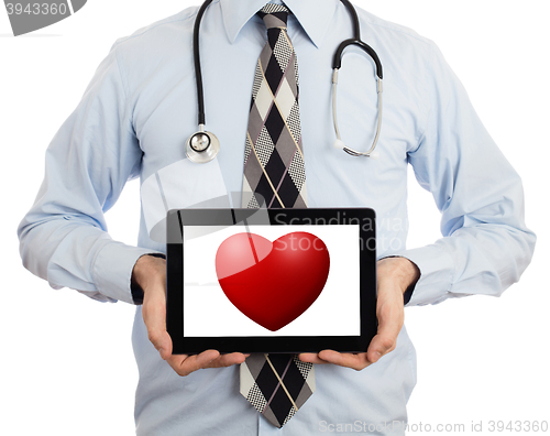 Image of Doctor holding tablet - Red heart