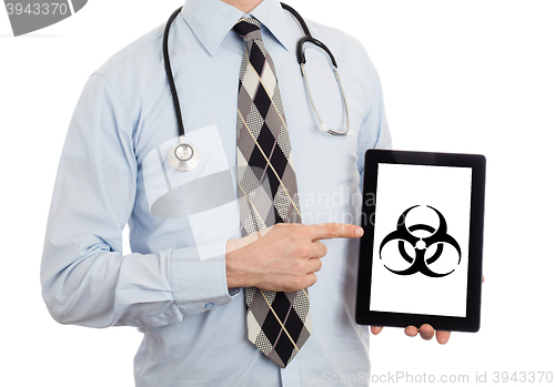 Image of Doctor holding tablet - Warning! Biohazard!