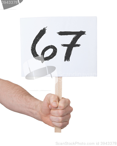Image of Sign with a number, 67