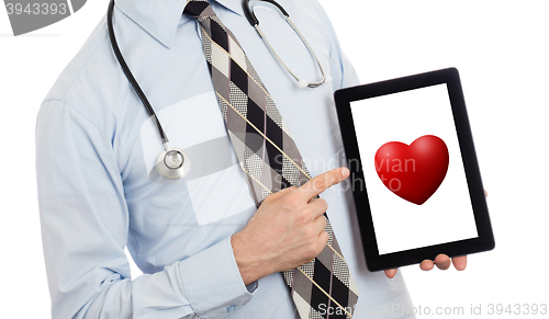 Image of Doctor holding tablet - Red heart
