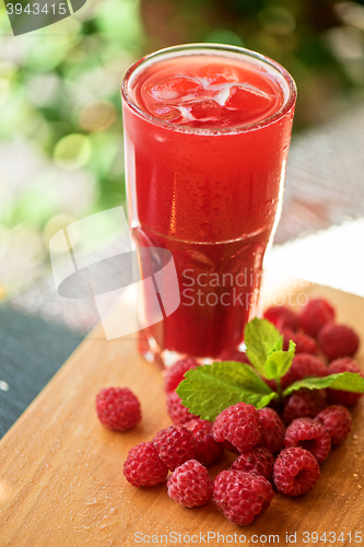 Image of fruit drink with raspberries