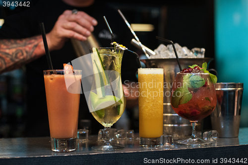 Image of cocktails on bar background