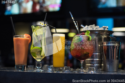 Image of cocktails on bar background