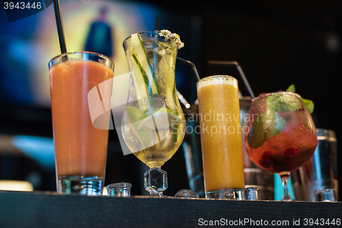 Image of cocktails on bar background