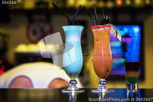 Image of cocktails on bar background