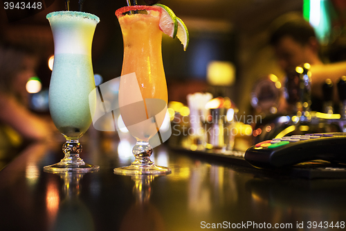 Image of cocktails on bar background