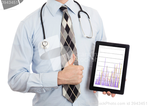Image of Doctor holding tablet - Graph
