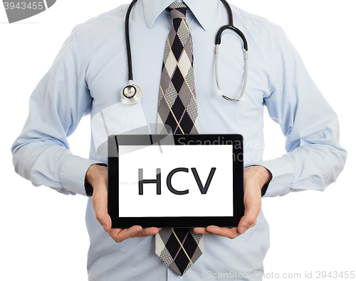 Image of Doctor holding tablet - HCV
