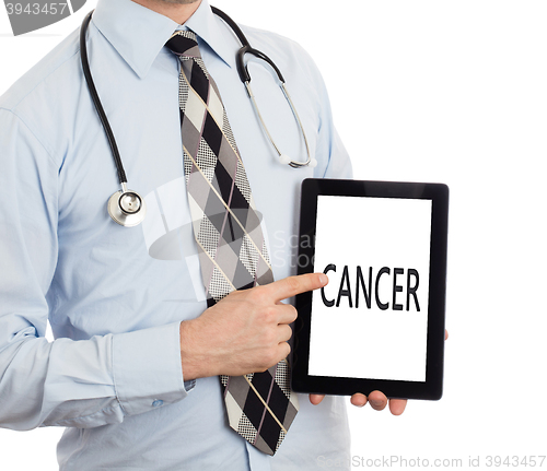 Image of Doctor holding tablet - Cancer