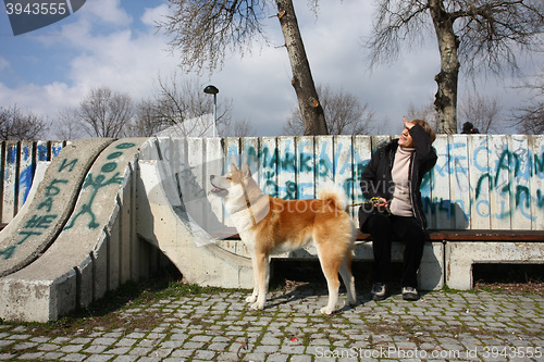 Image of Lady and her dog