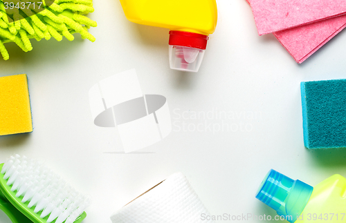 Image of House cleaning products on white table