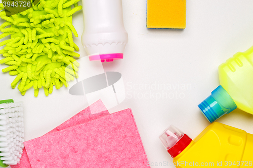 Image of House cleaning products on white table