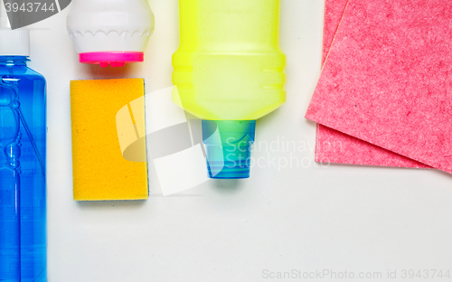 Image of House cleaning products on white table