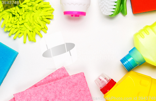 Image of House cleaning products on white table