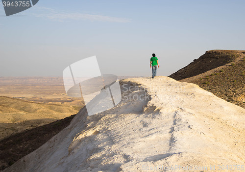 Image of Hiking people in desert