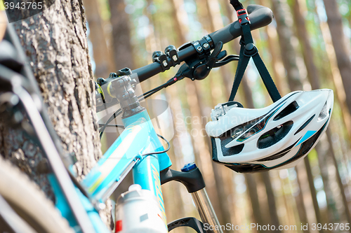 Image of cycling helmet closeup on bicycle outdoors