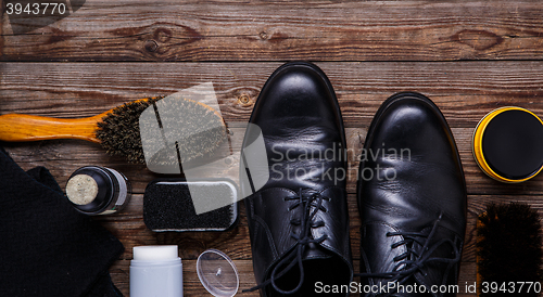 Image of Shoe wax, brush and boot