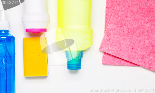 Image of House cleaning products on white table