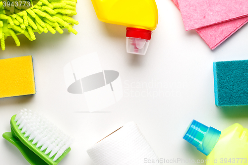 Image of House cleaning products on white table