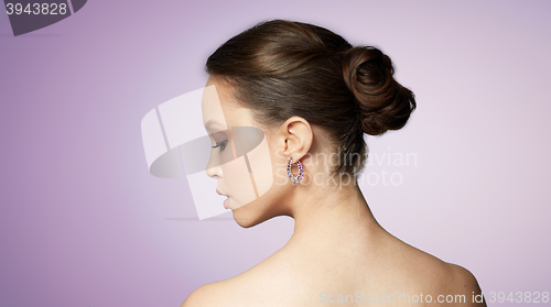 Image of close up of beautiful woman face with earring