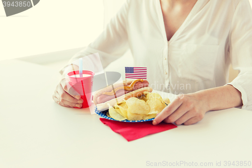 Image of woman celebrating american independence day