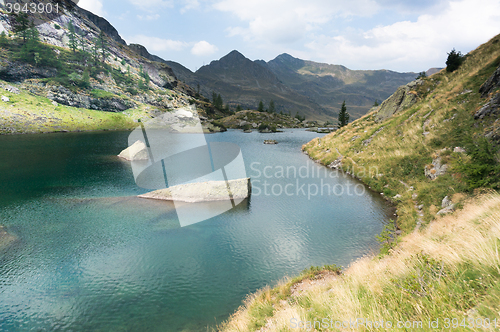 Image of Romantic mountain lake in Alps