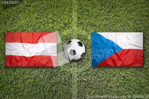 Image of Austria vs. Czech Republic flags on soccer field