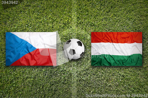 Image of Czech Republic vs. Hungary flags on soccer field