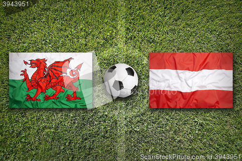 Image of Wales vs. Austria flags on soccer field