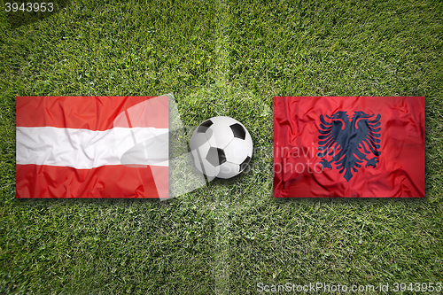 Image of Austria vs. Albania flags on soccer field