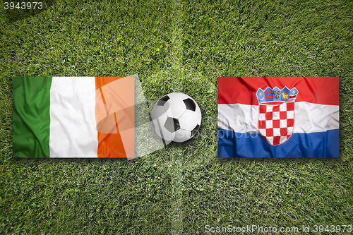 Image of Ireland vs. Croatia flags on soccer field