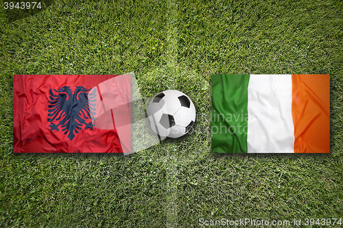Image of Albania vs. Ireland flags on soccer field