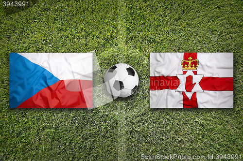 Image of Czech Republic vs. Northern Ireland flags on soccer field