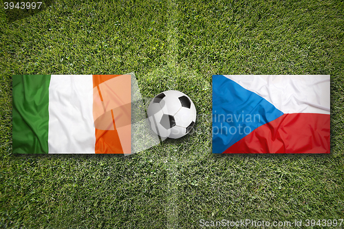 Image of Ireland vs. Czech Republic flags on soccer field