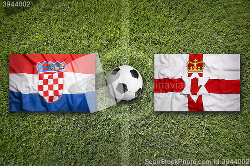 Image of Croatia vs. Northern Ireland flags on soccer field