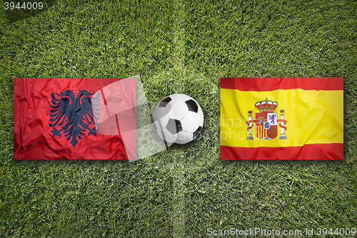 Image of Albania vs. Spain flags on soccer field